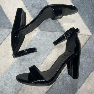 Black shiny heels by guess size 6.5